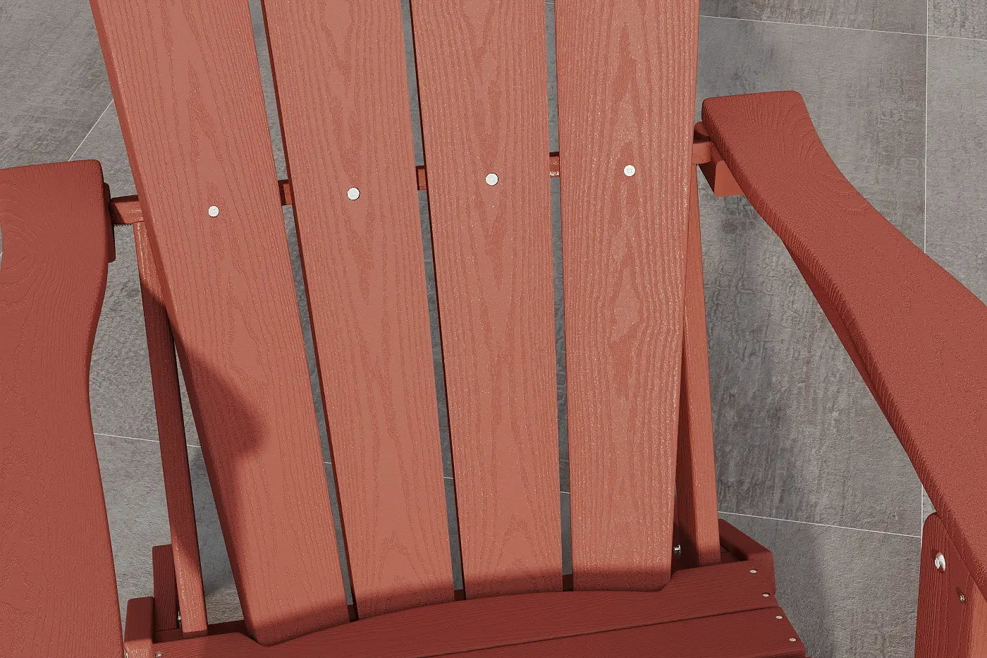 Red wooden chair with a gray stone background