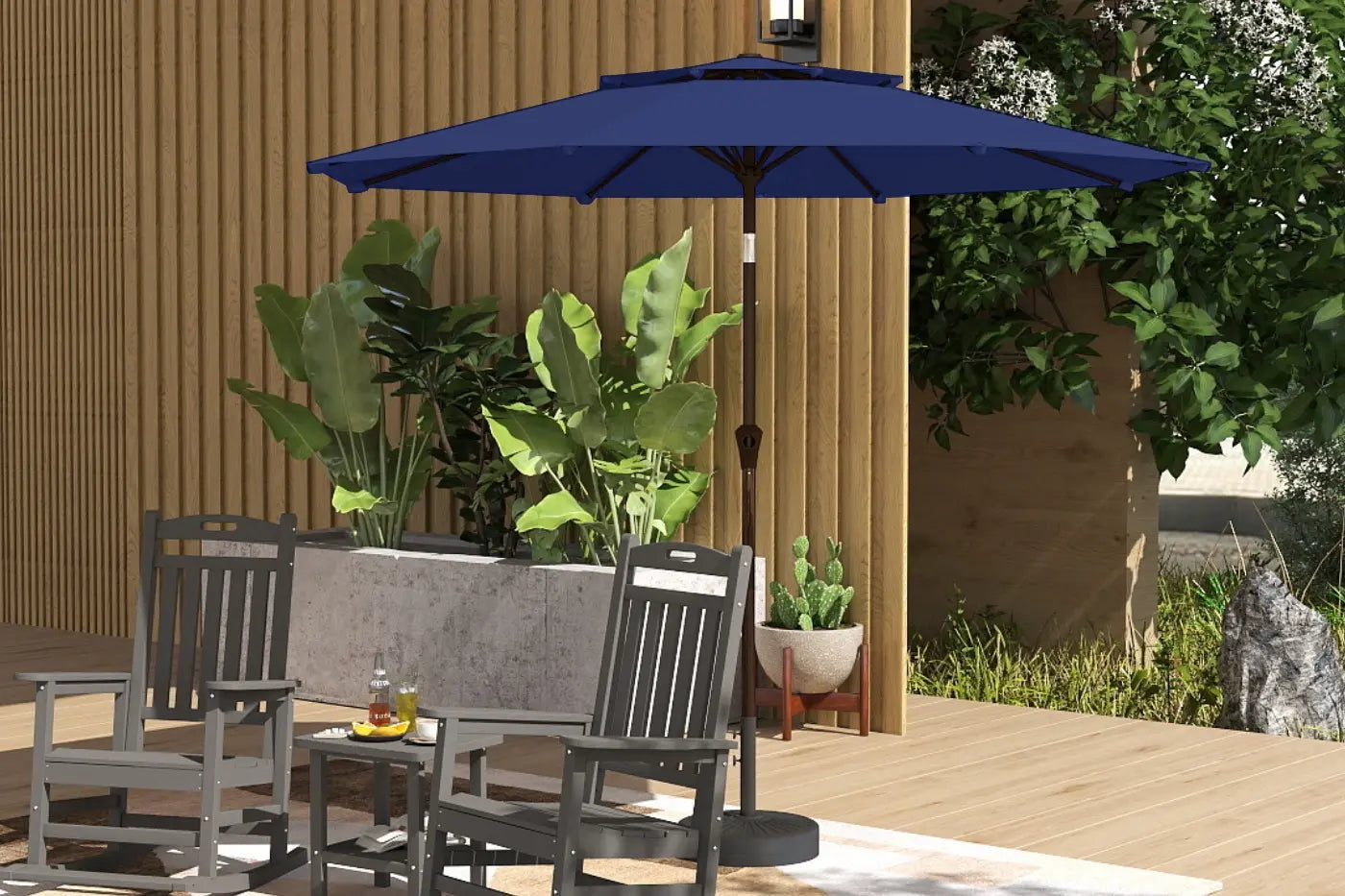 Patio set with blue umbrella, chairs, and table on a wooden deck.