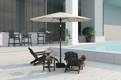 Outdoor patio set with umbrella, chairs, and table near a pool.