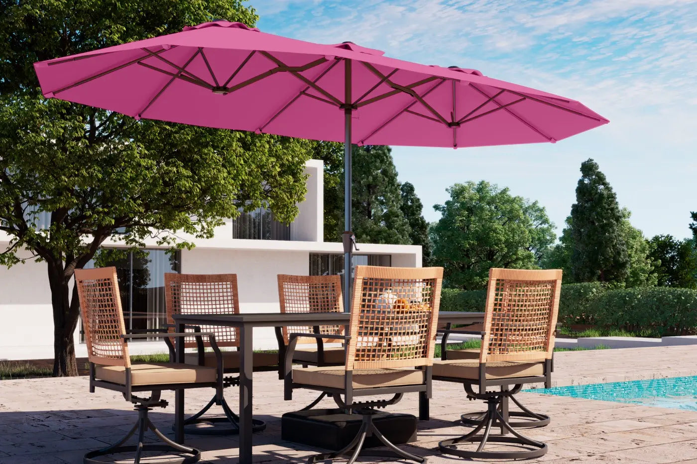 Outdoor dining set with pink umbrella by a poolside