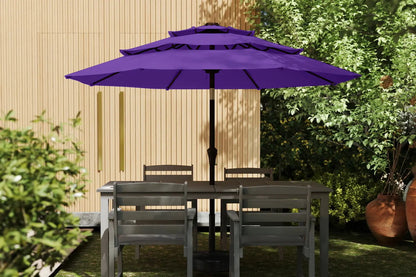 Purple patio umbrella over a table with chairs in a garden setting.