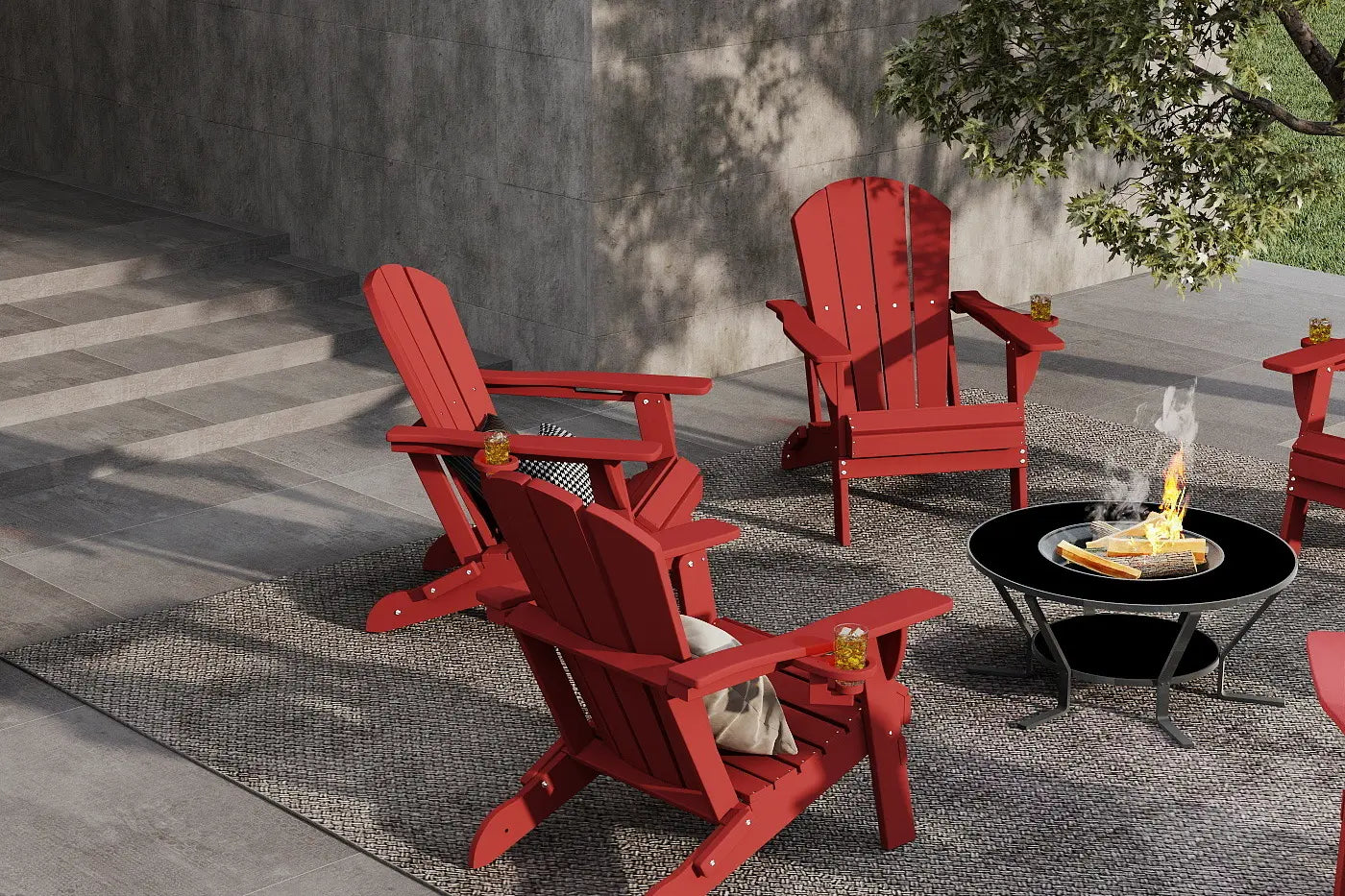 Red Adirondack chairs around a fire pit on a patio