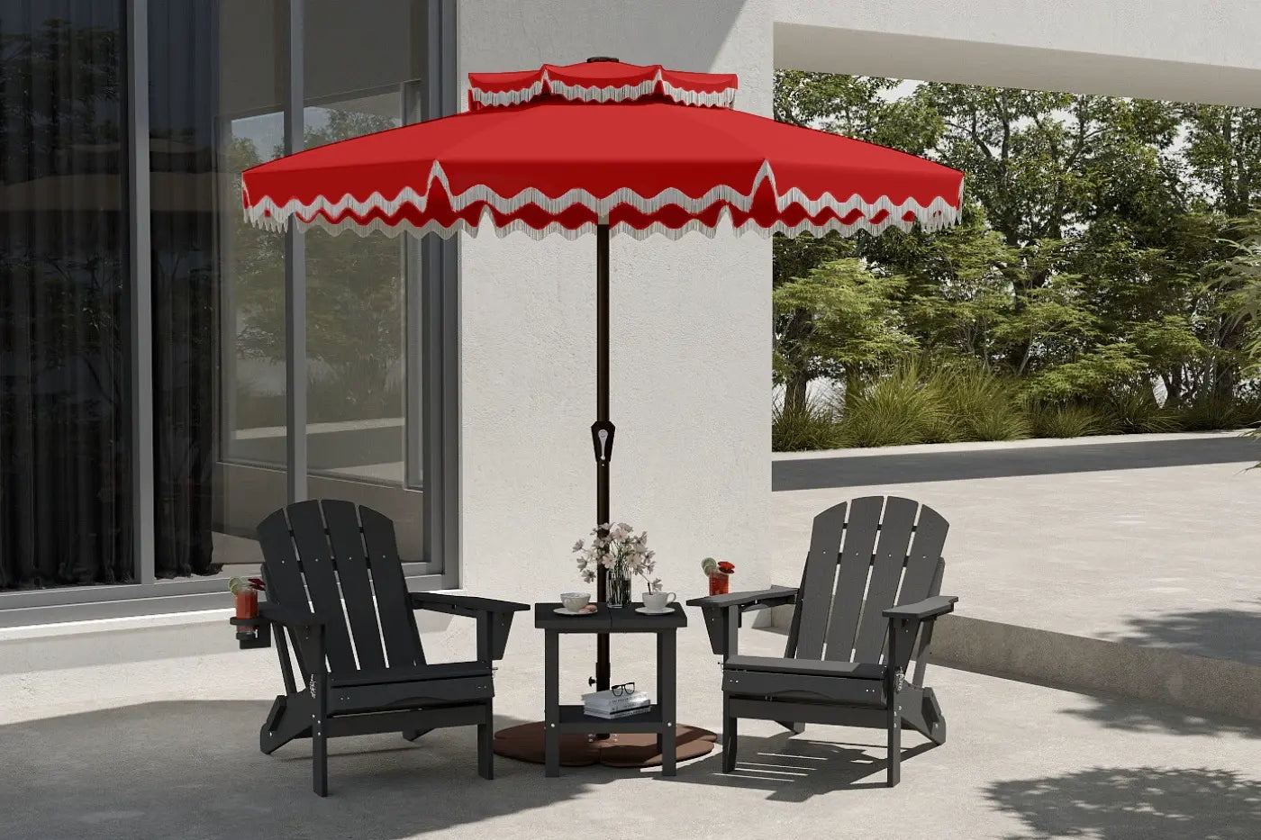 Red outdoor umbrella with white trim over two black chairs on a patio.