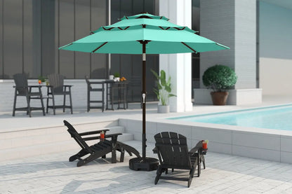 Turquoise patio umbrella with black base on a patio near a pool