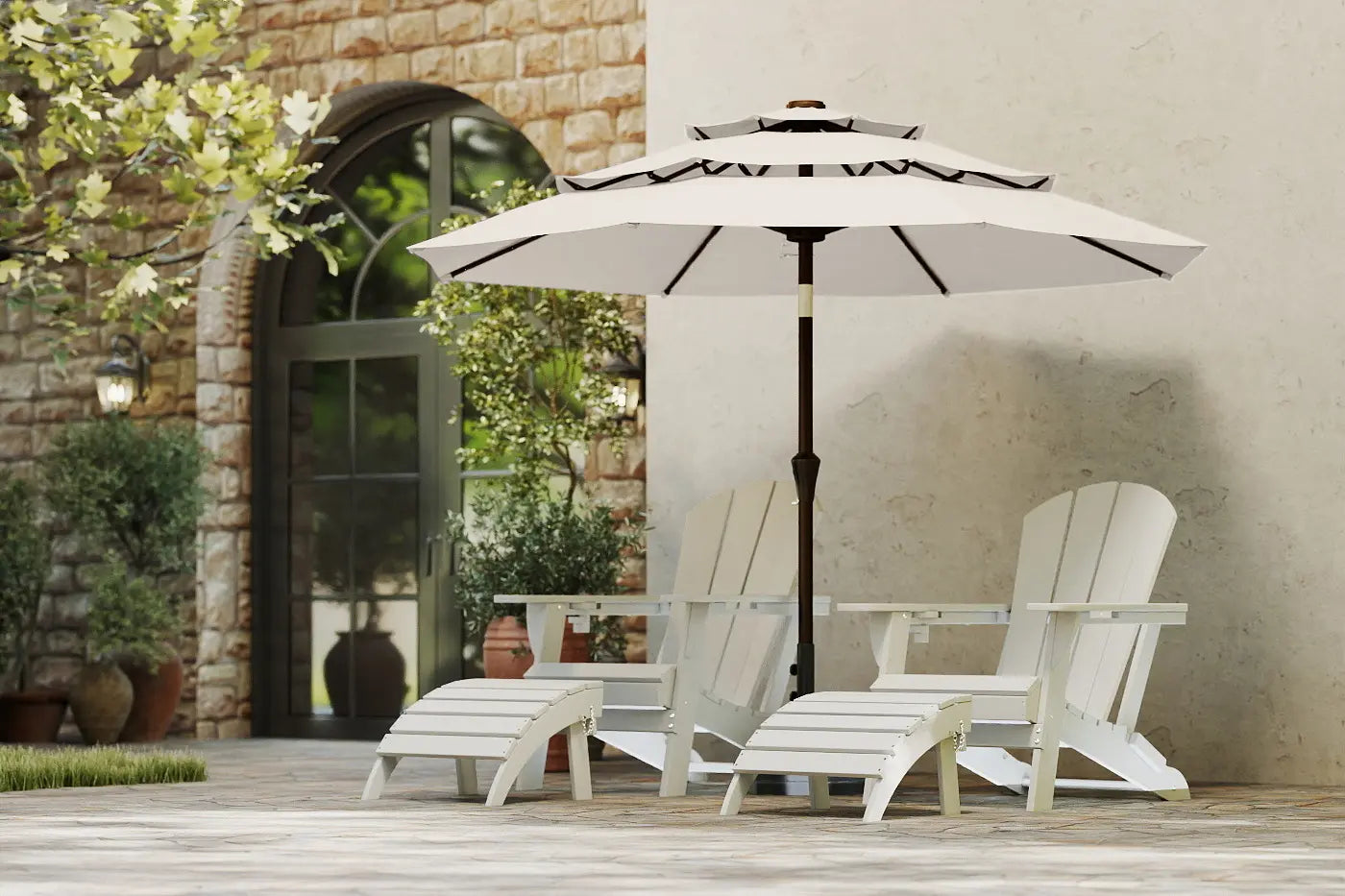White patio chairs and table with a large umbrella on a wooden deck.