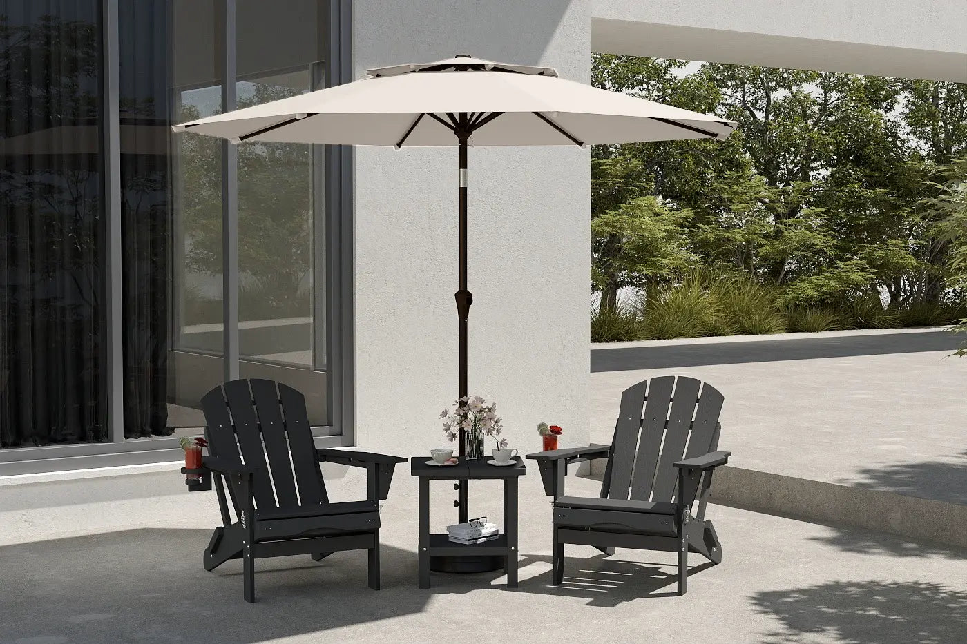 Outdoor patio set with two black chairs and a table under a beige umbrella on a patio.