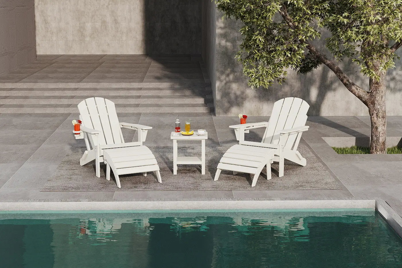 Two white Adirondack chairs by a pool with a small table holding drinks.