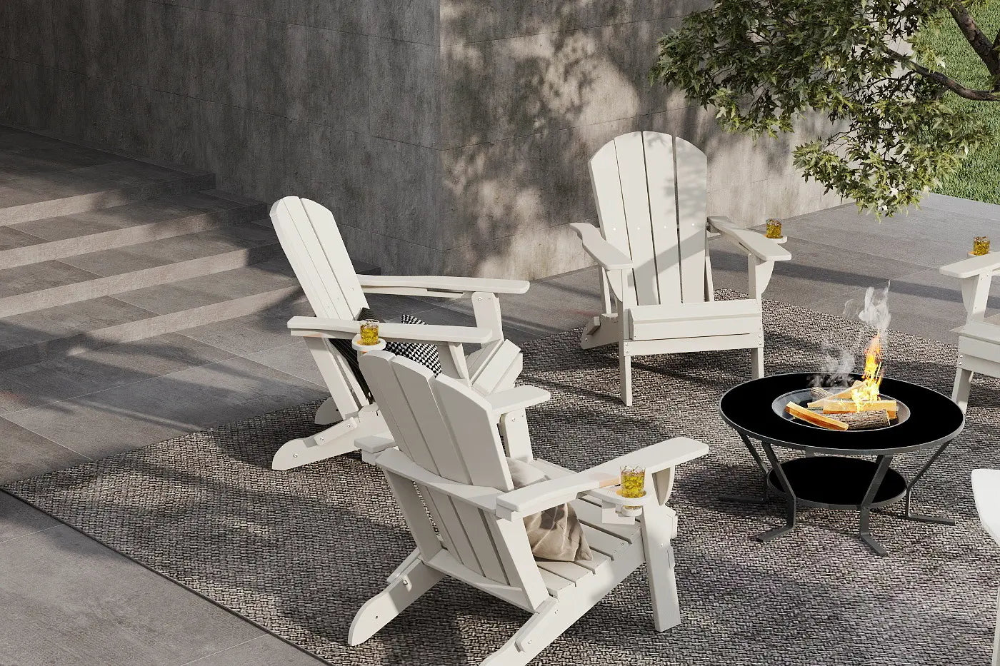White Adirondack chairs around a fire pit on a patio