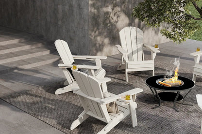 White Adirondack chairs around a fire pit on a patio