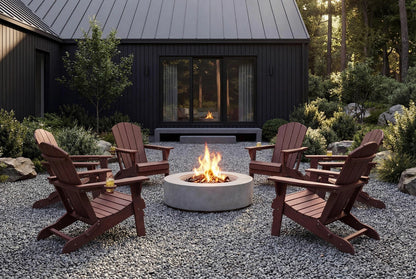 Outdoor setting with HDPE chairs around a fire pit in front of a house.
