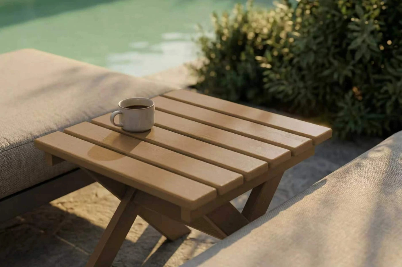 HDPE side table with a cup on it by a poolside
