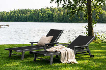 Black HDPE Outdoor Chaise Lounge with Textilene Fabric by the lake