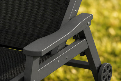Black HDPE Outdoor Chaise Lounge with Textilene Fabric, featuring exquisite workmanship.