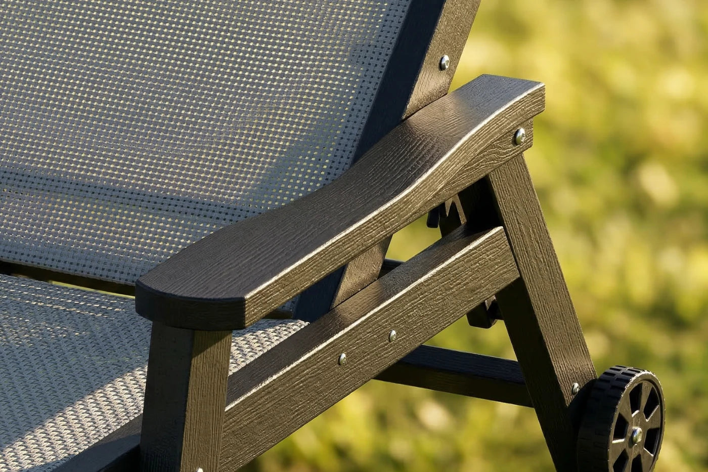 Dark gray HDPE Outdoor Chaise Lounge with Textilene Fabric, featuring exquisite workmanship.