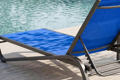 Blue lounge chair by a pool