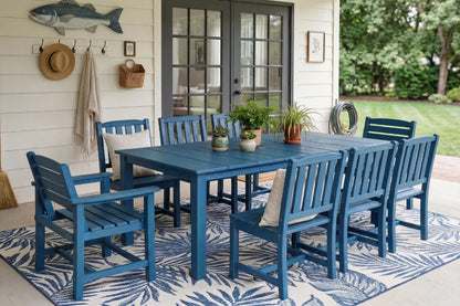 Blue outdoor dining set with chairs and table on a patio