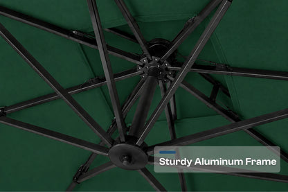 Close-up of the underside of a patio umbrella showing a dark green canopy and a black aluminum frame with radiating ribs. A text overlay reads 'Sturdy Aluminum Frame'.