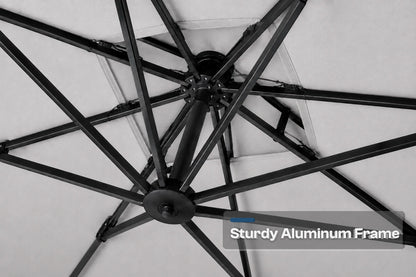 Close-up of a black aluminum patio umbrella frame with radiating ribs and a central hub, shown against a gray background with a text overlay reading 'Sturdy Aluminum Frame'.