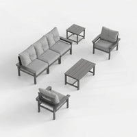 Outdoor furniture set with a sofa, chairs, and tables on a white background