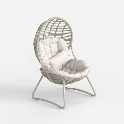 Wicker chair with white cushion on a white background