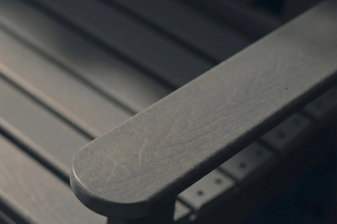 Close-up of a metal bracket on a dark background