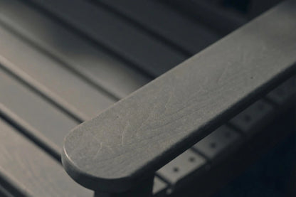 Close-up of a metal bracket on a dark background