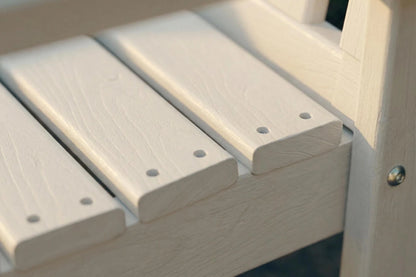 Close-up of a wooden bench with visible screws.