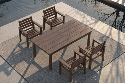 A 5-piece outdoor dining set consisting of a rectangular slatted table and four matching armchairs, shown from an elevated angle on a patio next to a body of water.