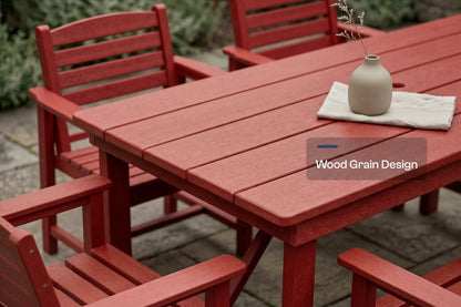 Red outdoor furniture set with a table and chairs on a patio.