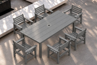 A gray outdoor dining set consisting of a rectangular slatted table and six matching armchairs, shown on a paved patio with dappled sunlight and shadows.