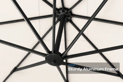Close-up of a black aluminum umbrella frame with radiating ribs and a central hub, shown against a light neutral background. A text overlay reads 'Sturdy Aluminum Frame'.