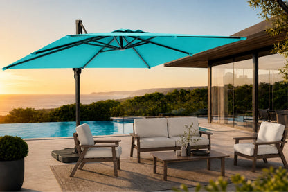 A large turquoise cantilever patio umbrella in a modern outdoor setting next to a swimming pool and lounge furniture.